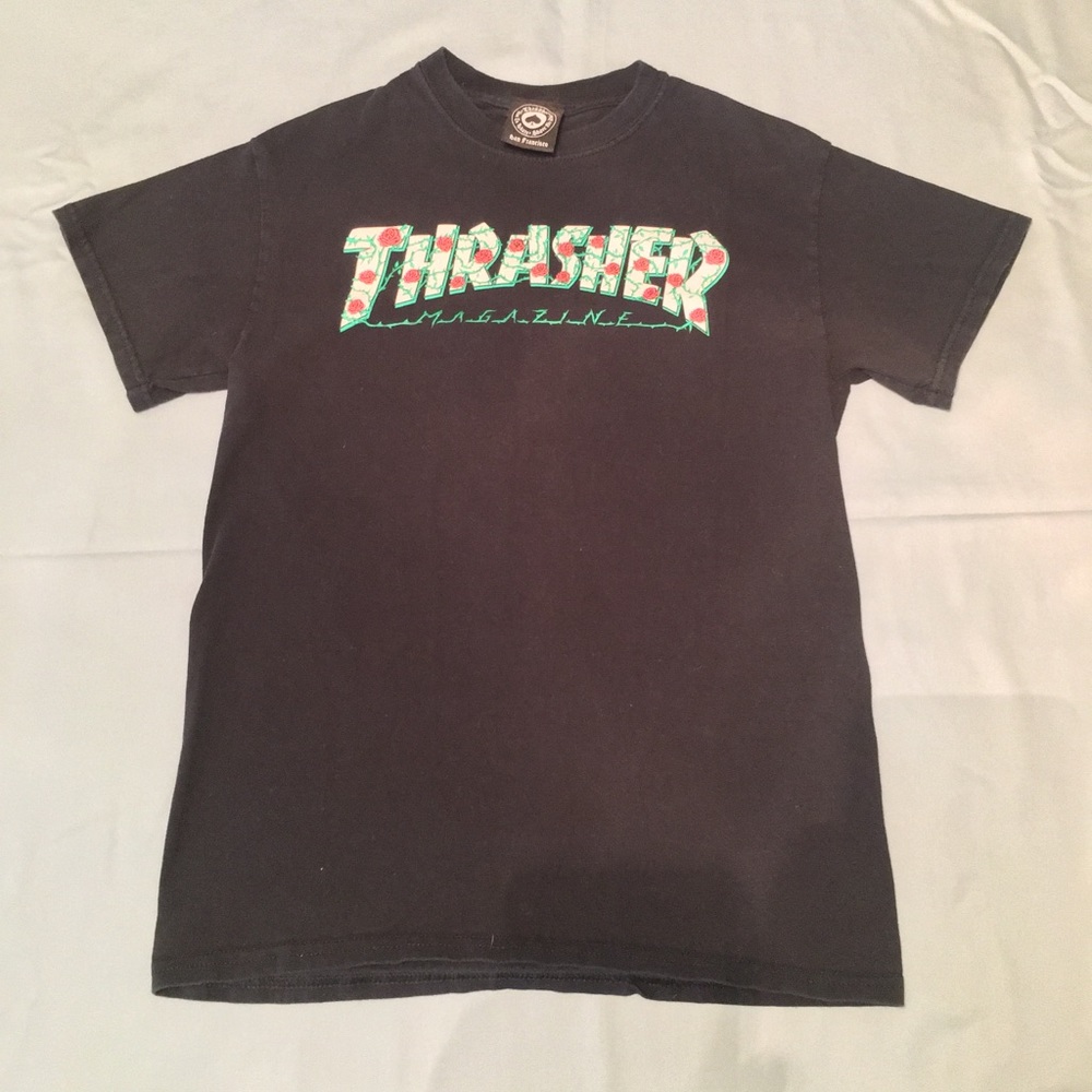 black thrasher shirt with roses around the label